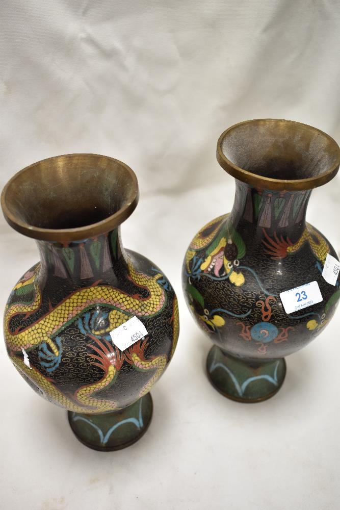 A pair of early 20th century Chinese cloisonne vase of baluster form decorated with traditional - Image 2 of 3