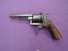 A 19th century possible Belgian Pin Fire Pistol having hexagonal barrel, fold away trigger, wooden