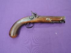 A 19th century Percussion Pistol having octagonal barrel marked Newcastle On Tyne, Burnand to