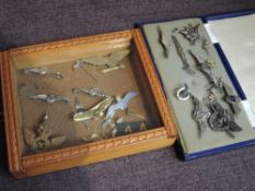 A collection of Air Force Sweetheart Broaches including RAF, Pegasus and German in two small display