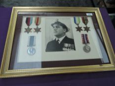 A framed and glazed Medal Display to JX158547 P/Off W.B.SMITH, HMS DRAKE, 39-45 Star, Africa Star,
