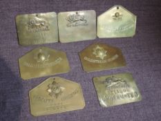 Seven Regimental brass bed plates, Kings Own, 17th/21st Lancers, Coldstream Guards and 1st Scots