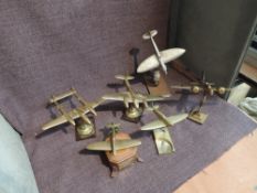 Seven brass or chrome model Aeroplanes on stands, all WW2 Fighters or Bombers