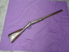 A British Sporting Percussion Ball and Shotgun with Ramrod by Clarke, decorated lock, 10 bore,