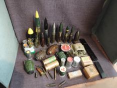 A collection of Deactivated and used Shells, Bullets and Grenades along with flare cartridges etc