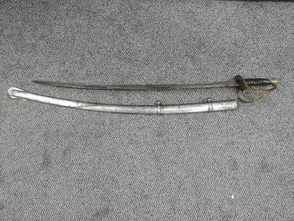 A possible US Cavalry Troopers Sword model 1860, plain blade with no makers marks seen, leather grip