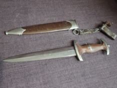 A German WWII SA Service Dagger 1933 with brown scabbard with blade hanger, brown grip, blade marked