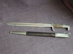 A German WW2 Police Bayonet having single edge blade, blade length 33cm, marked ACS with a pair of