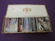 A box of Miniature Military Medals and Ribbons, Clasps etc