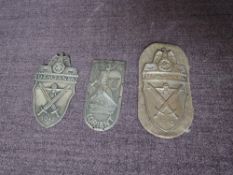 Three German WW2 plaques, Demjansk 1942 on cloth backing another loose and a Lorient 1944 (3)