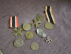A collection of Medals and Badges including German 1939 War Merit Cross x2, German Dresden 1913