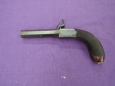 A 19th century Turn Barrel Percussion Pocket Pistol having hexagonal barrel by T Conway Manchester