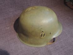 A German WW2 M42 Army Helmet with single decal to right hand side of Waffen SS, size 59, with chin