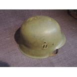 A German WW2 M42 Army Helmet with single decal to right hand side of Waffen SS, size 59, with chin