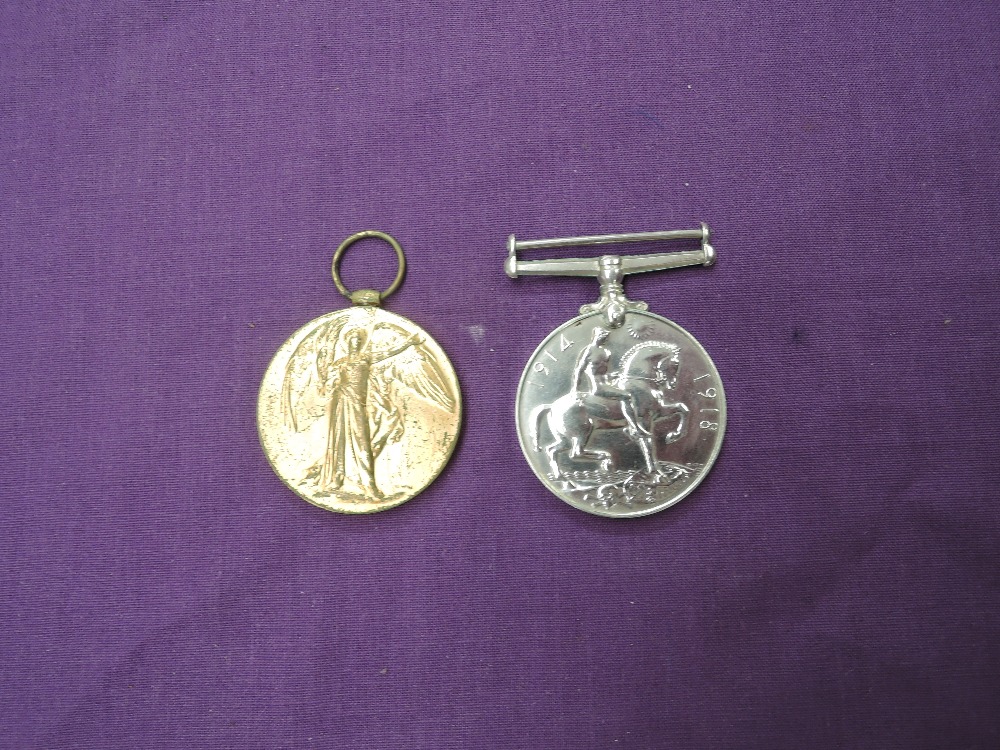 A WW1 Medal Pair to 25738 PTE.J.BROWN.Lan.Fus, War Medal and Victory Medal, no ribbons