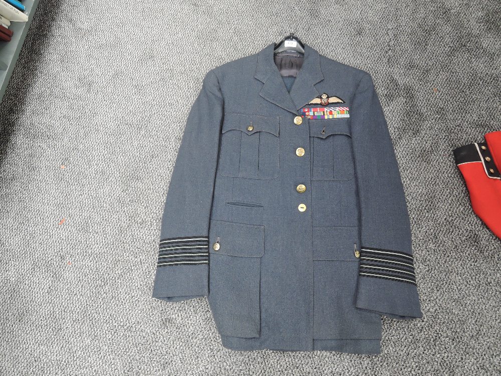 A RAF Group Captains Jacket & Trousers, all buttons present, RAF cloth badge with three rows of