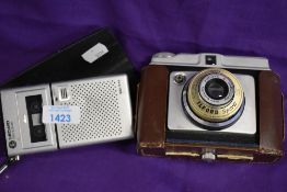 A vintage Ilford sporti camera and a Decimo pocket secretary.