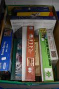 Eleven 500 to 1200 piece jigsaw puzzles of gardening, map and comic interest etc.