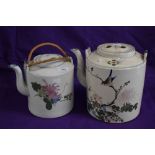 Two oversized Chinese tea pots, one late 19th/early 20th century, the other 20th century, having