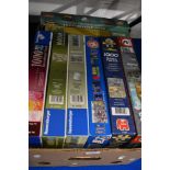 Eight 1000 piece jigsaw puzzles with a range of subjects including floral, country life and maps