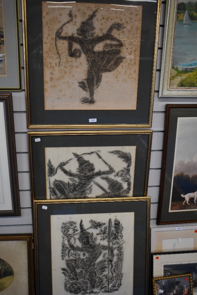 A group of three 20th century Thai rubbings, scenes from the Ramayana, mounted framed and glazed