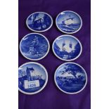 Six miniature Royal Copenhagen plates, having scenes of boast, buildings and statues etc.