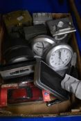 Ten modern clocks, a 1/38 scale die cast car and two pen knives etc.