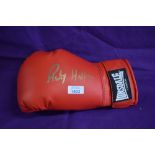 A modern Lonsdale boxing glove bearing printed signature Ricky Hatton