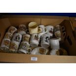 A collection of mainly QE11 Coronation ware mugs, plates and saucers. Also includes a beer tankard.