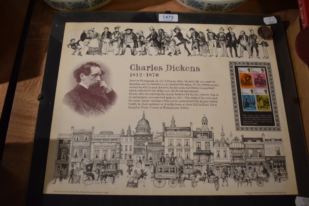 A set of four Charles Dickens stamps framed with poster.