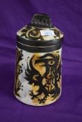 A 1960s lidded Celtic pottery mousehole jar.