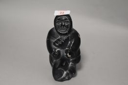 A Vintage Inuit Carved Stone Figure of a Hunter With Fish Eskimo 16cm High