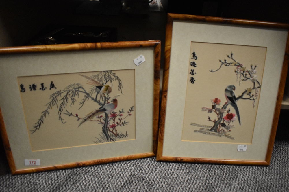 Two 20th century Chinese silk screen embroidered panels of birds of paradise.