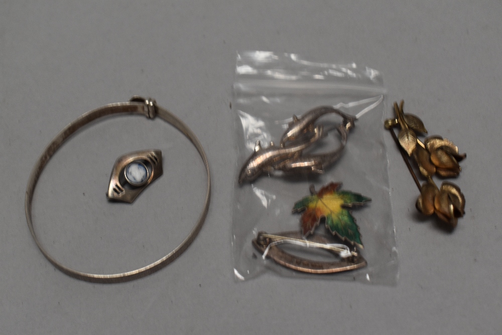 A 925 marked silver dolphin brooch with another HM silver brooch and bangle etc.