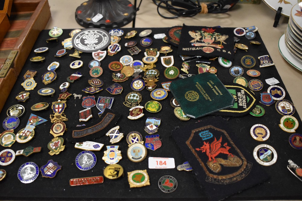 A good selection of vintage enamel pin badges of crown green bowling interest.