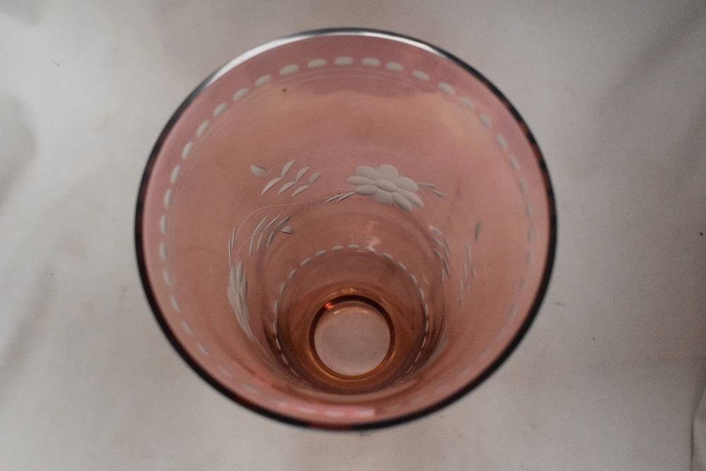 A modern pink lustre glass vase having an etched floral design. - Image 2 of 2