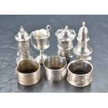 A group of mixed hallmarked silver items, to include pepperettes, small trophy marked 'Yokohama 1918