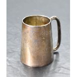 A late Victorian silver christening tankard, of spreading cylindrical form with simple tubular