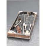 A group of mixed silver items, to include a silver mounted tray, silver banded clothes brush, silver