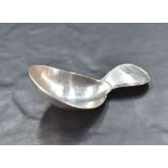 A George III silver caddy spoon, nicely proportioned with oval bowl and short moulded handle,