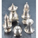 A group of five silver pepperettes, each of varying size, design, age and maker, gross weight