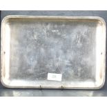 An unusual 20th century silver tray, of shallow dished and rounded rectangular for, with marks