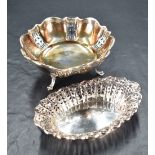A George VI silver dish, of shaped circular form with pierced decoration and raised on out-swept