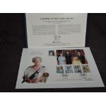 A Queen Elizabeth II Royal Mint 2002 Gold Shield Back Sovereign on large commemorative cover,