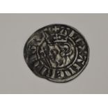 An Alexander III 1280-1286 Silver Penny, portrait side has head with crown holding staff, long cross