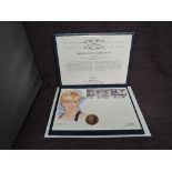 A Queen Elizabeth II Royal Mint 1999 Gold 1oz 5 Pound Coin on large hand painted Diana 1961-1997