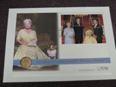 A Queen Elizabeth II Royal Mint 2000 Gold Sovereign on large Commemorative Cover, celebrating the