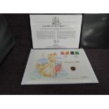 A Queen Elizabeth II Royal Mint 2002 1/4 ounce 25 Pound Britannia on large hand painted