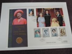 A Queen Elizabeth II Royal Mint 2001 Gold Sovereign on large Commemorative Coin Cover, celebrating