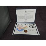 A Queen Elizabeth II Royal Mint 2002 Gold 1oz 5 Pound Coin on large hand painted Queen's Golden